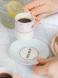 Yvonne Ellen multi slogan espresso cup and saucer set of 2 (British brand)