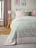 Pale pink floral woodblock quilted bedspread, imported from the UK