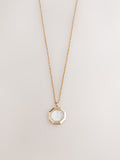Gold tone mother of pearl octagon necklace, UK version