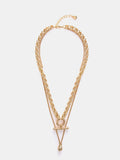 Mint Velvet layered gold necklace, UK version