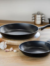 Next Kitchencraft Set of 2 Black Non Stick Induction Frying Pans, 20cm and 28cm- Buy online at McGrocer
