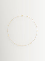 Next Tory Burch Gold Tone Delicate Moondance Pearl Necklace- Buy online at McGrocer