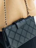 Tory Burch Black Fleming mini chain wallet, UK version