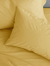 Next Catherine Lansfield Ochre Easy Iron Percale Pillowcases (Set of 2)- Buy online at McGrocer