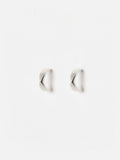Oliver Bonas sterling silver huggie earrings with faceted surface, imported from the UK