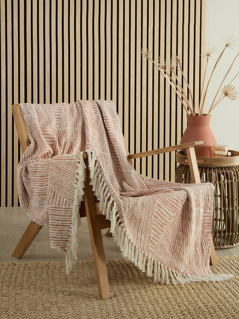 Appletree Myan cotton throw blanket in terracotta, UK version