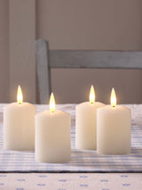 Next Lights4fun Set of 4 Natural Rechargeable TruGlow Votive Candles 6.5cm- Buy online at McGrocer