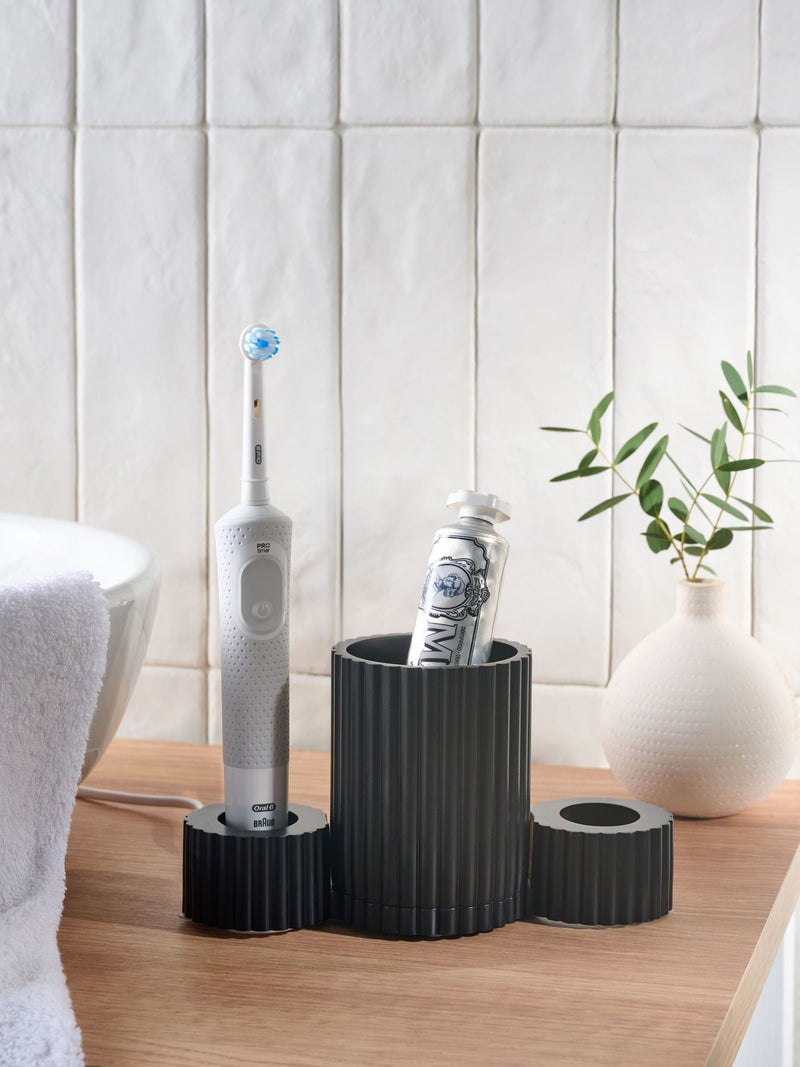 Black resin ribbed electric toothbrush holder - British product