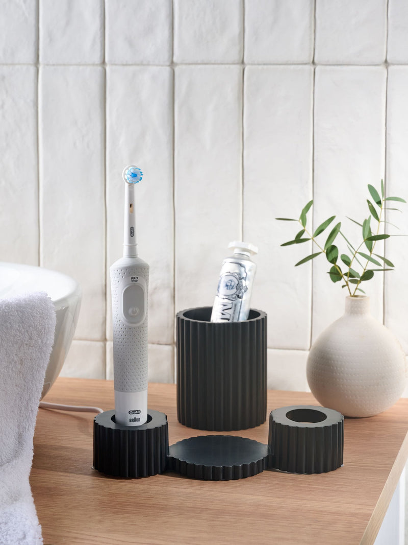 Black resin ribbed electric toothbrush holder - British product