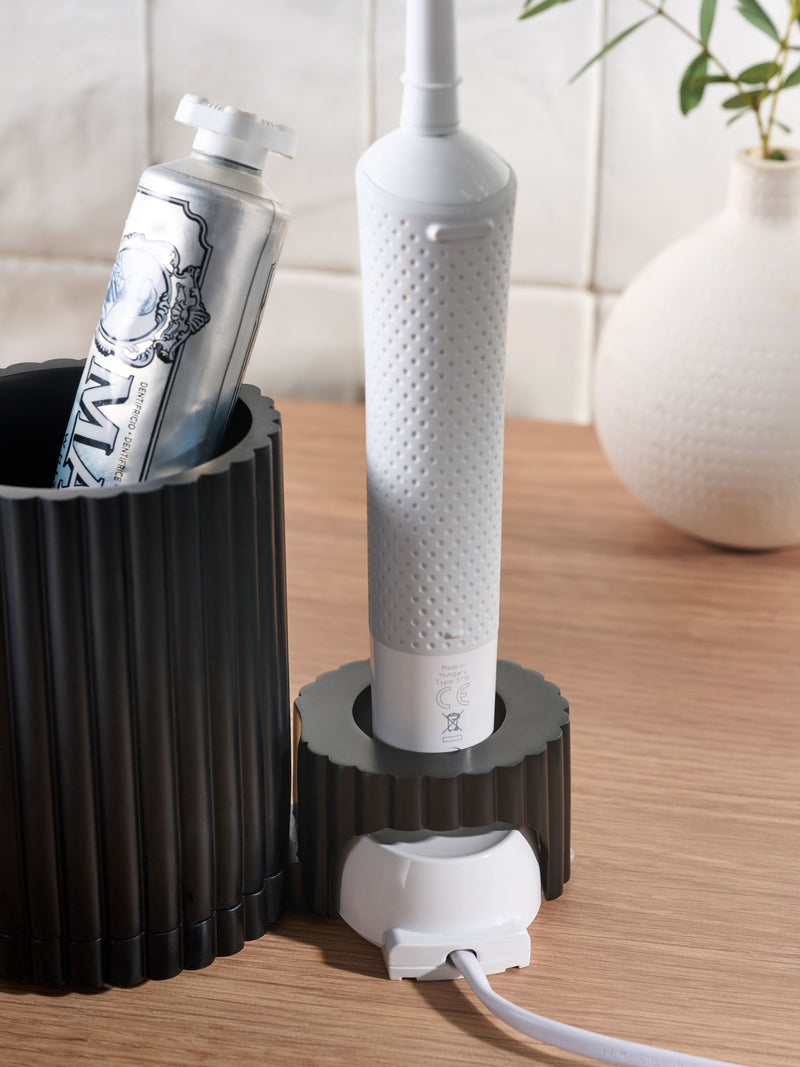 Black resin ribbed electric toothbrush holder - British product
