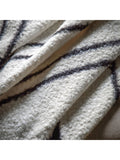 Gallery Home cream scalloped throw, imported from the UK