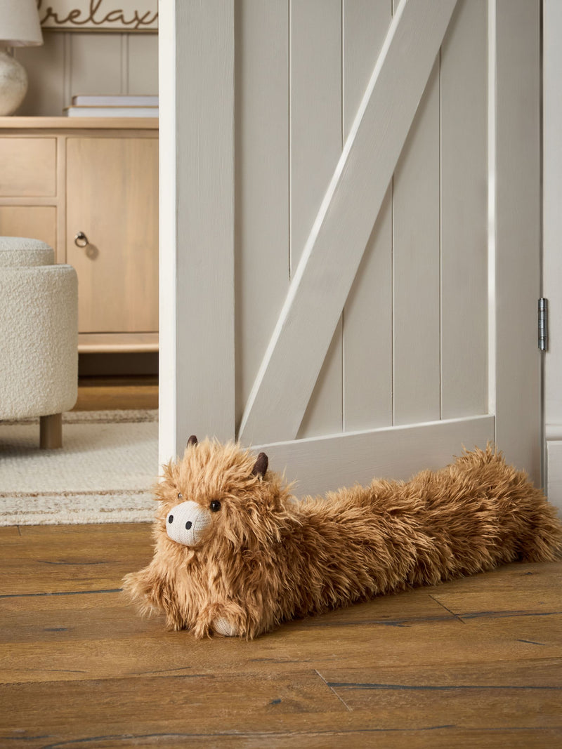 Hamish the Highland Cow draught excluder, imported from the UK