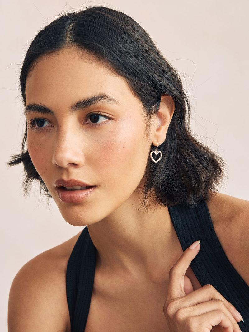 Rose gold tone pavé heart drop earrings, imported from the UK