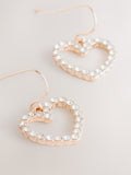 Rose gold tone pavé heart drop earrings, imported from the UK