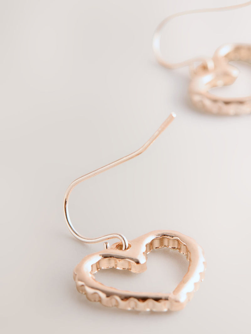 Rose gold tone pavé heart drop earrings, imported from the UK