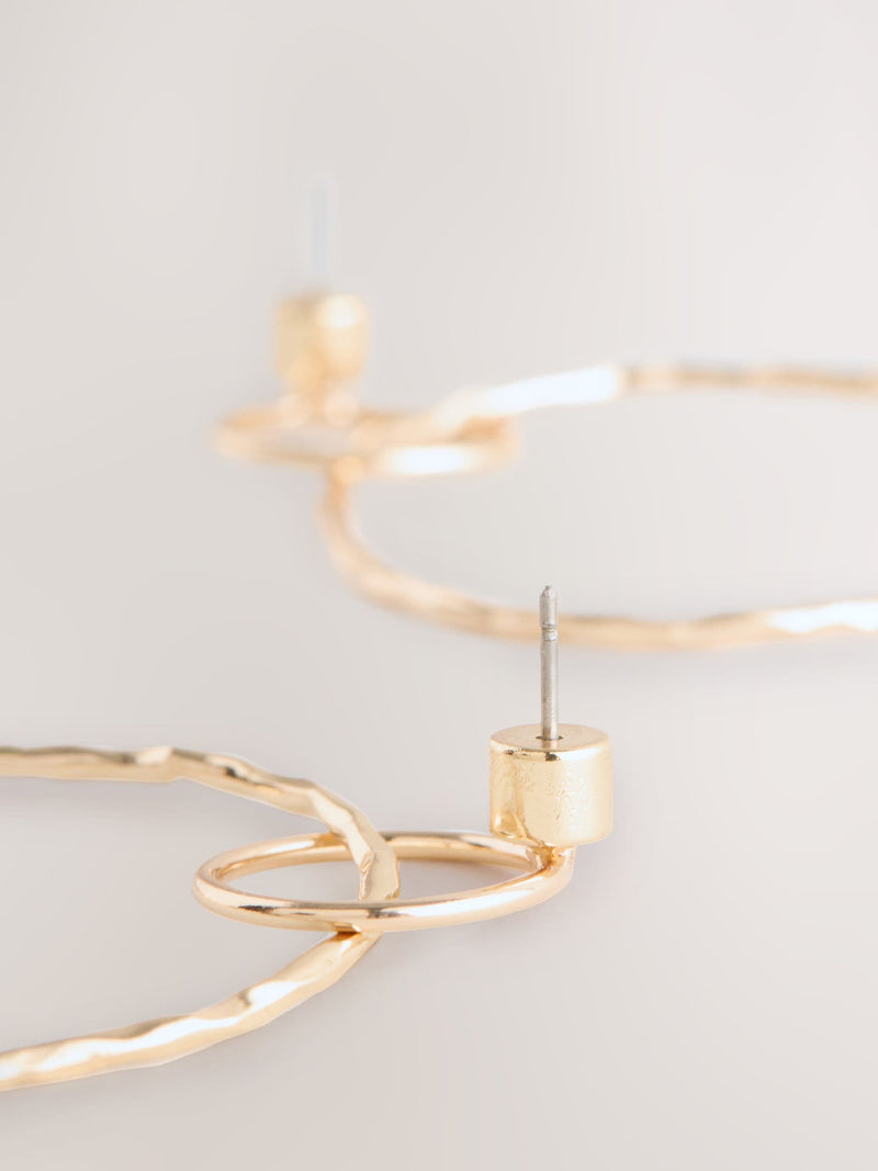 Gold Tone Circle Drop Earrings 91% Recycled brass, UK version