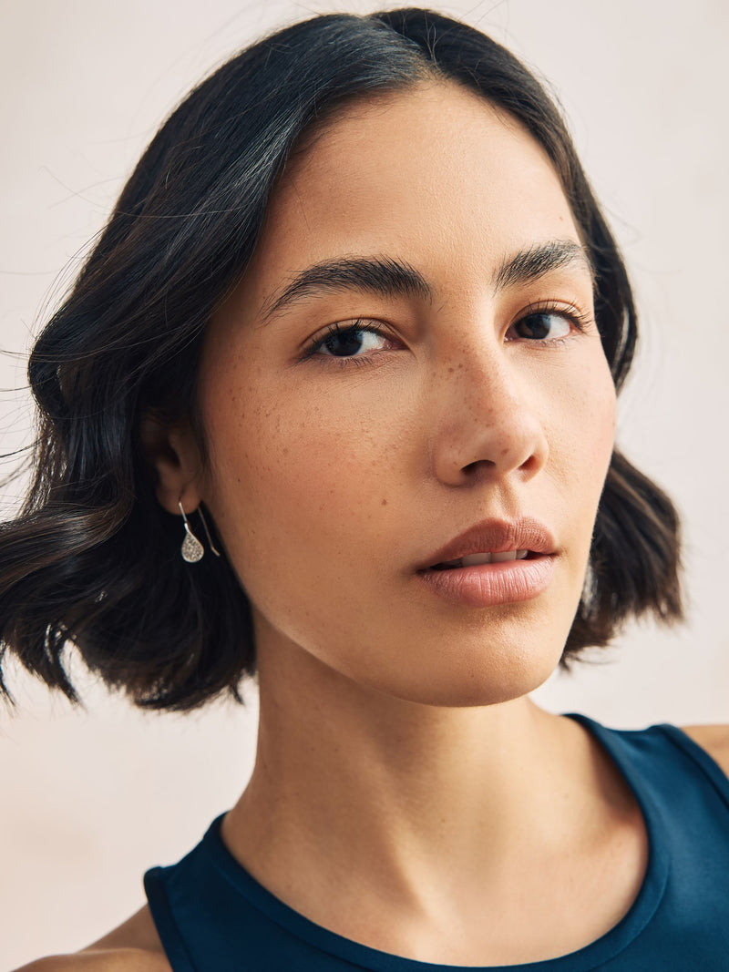 Silver tone sparkle petal drop earrings (British brand)