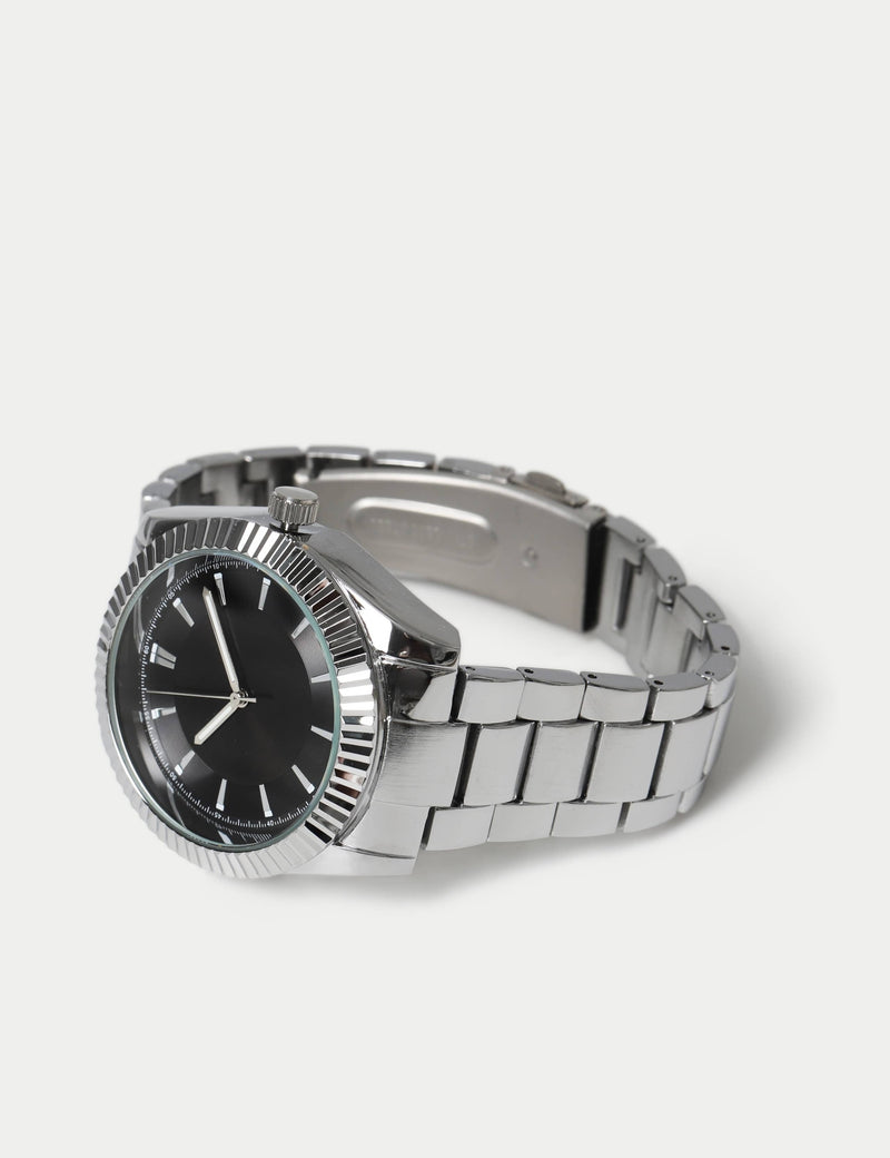 Faceted bezel steel black dial watch, UK version