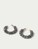 Faceted natural stone hoop earrings with iron accents, imported from the UK