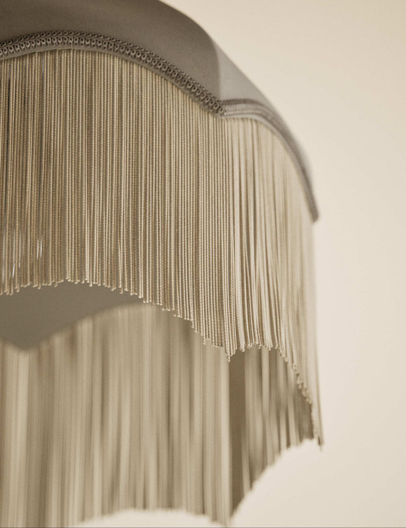 Fringed velvet lamp shade with braided tassel trim, imported from the UK