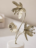 Gold flower ornament on marble base, imported from the UK