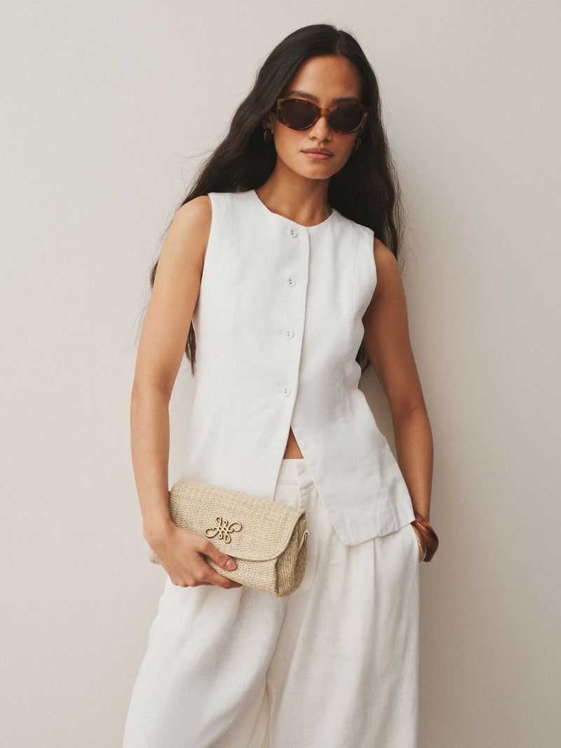 Raffia effect cross-body bag with gold clasp (British brand)