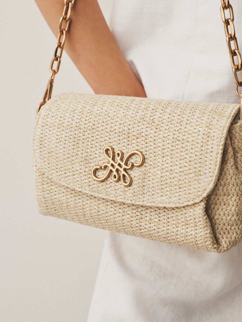 Raffia effect cross-body bag with gold clasp (British brand)