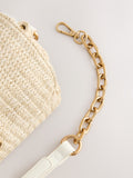 Raffia effect cross-body bag with gold clasp (British brand)