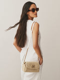 Raffia effect cross-body bag with gold clasp (British brand)