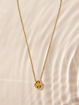 Next Gold Tone Waterproof Stainless Steel Pebble Necklace- Buy online at McGrocer