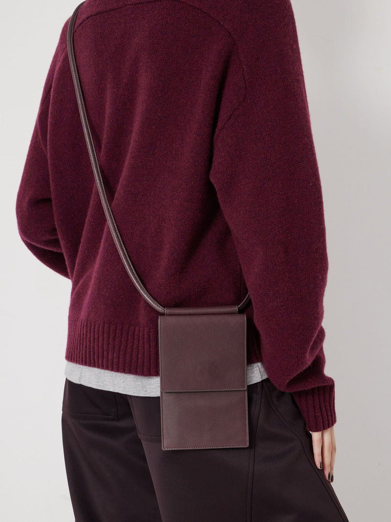 Hush red leather crossbody phone bag for travel (British brand)