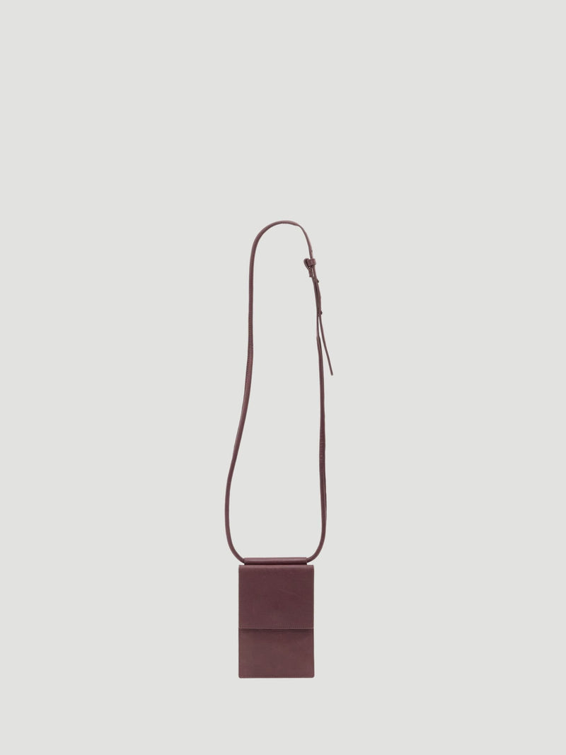 Hush red leather crossbody phone bag for travel (British brand)