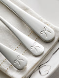 Silver bow cutlery set 16 piece, imported from the UK