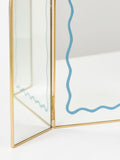 Oliver Bonas gold bow arch mirror 37cm, imported from the UK