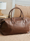 Personalised tan faux leather weekend bag, imported from the UK