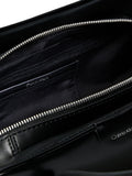 Calvin Klein black shoulder bag with coated fabric, UK version