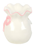 Something Different white and pink bow oil burner, UK version