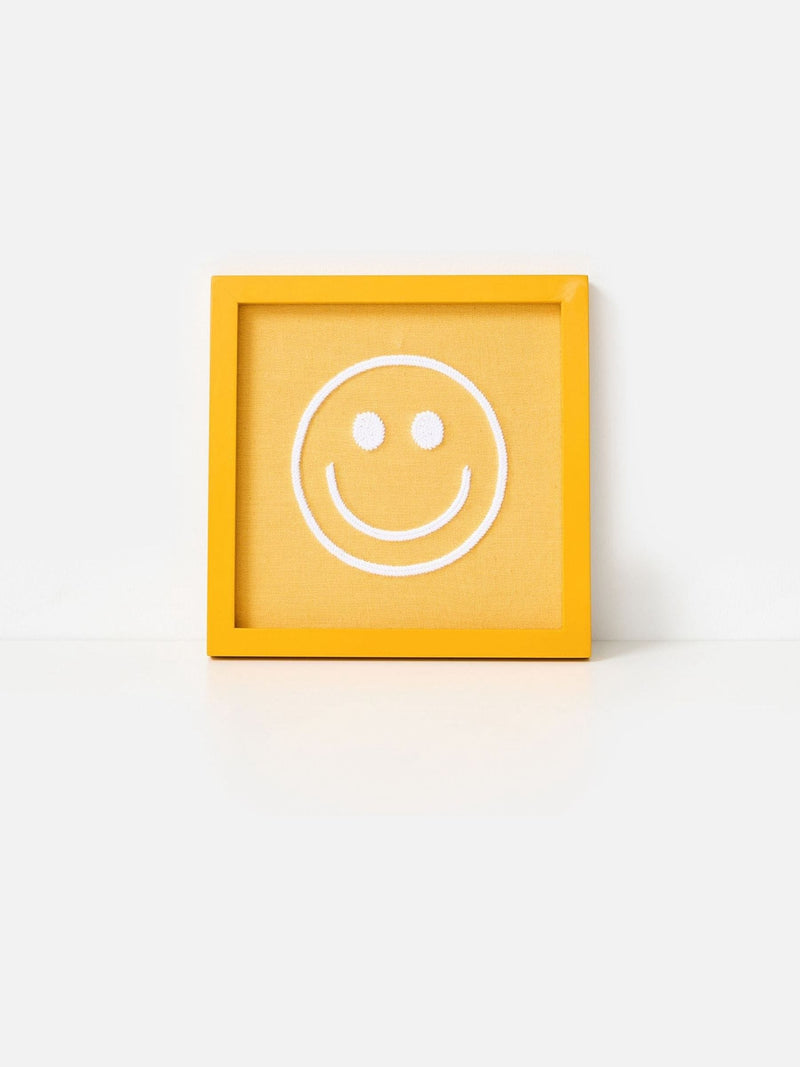 Oliver Bonas yellow embroidered happy face wall art 23cm, imported from the UK