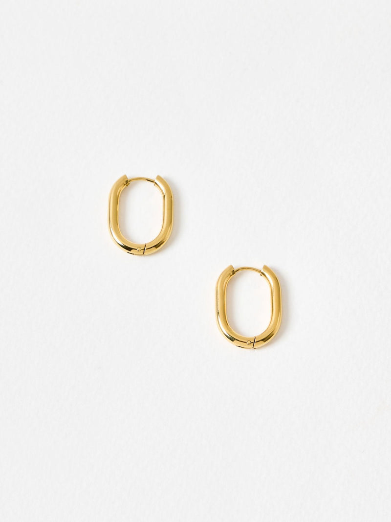 Oliver Bonas gold tone oval hoop earrings, imported from the UK