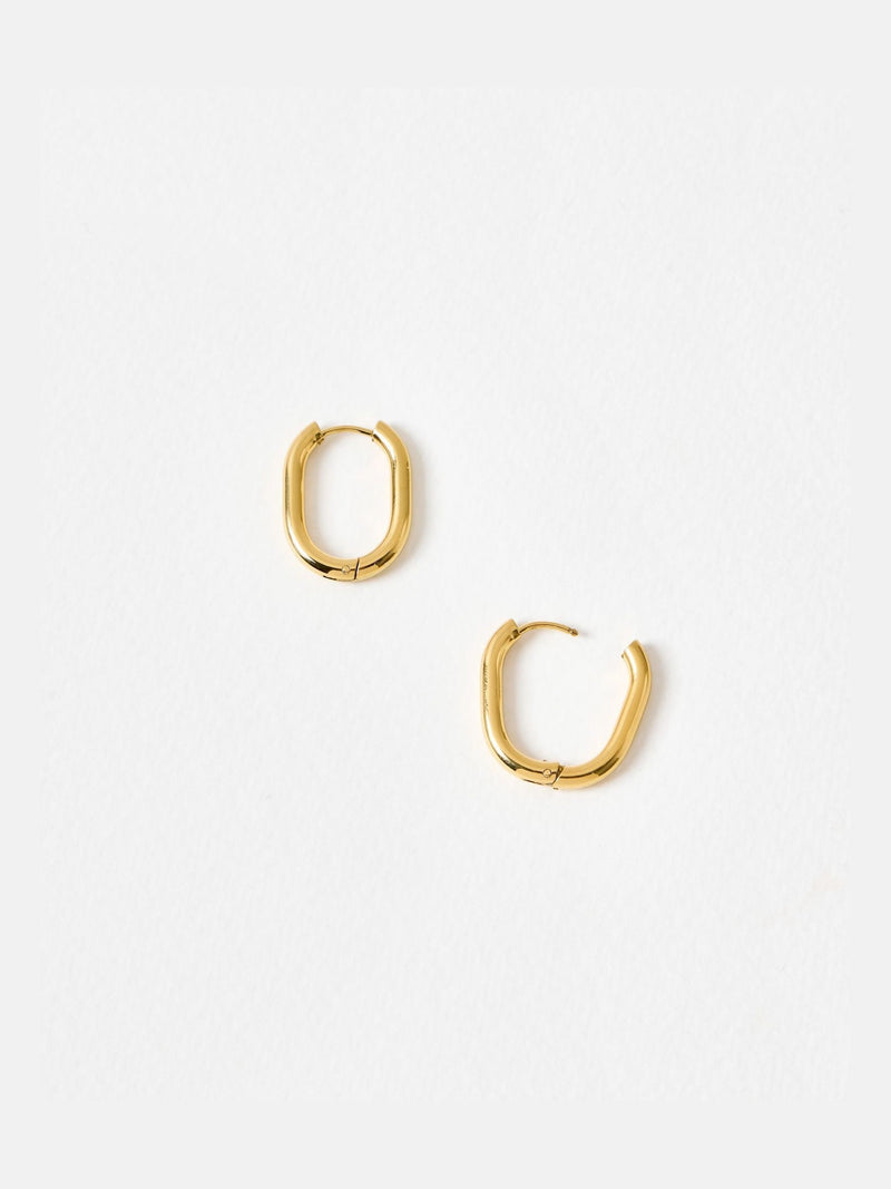 Oliver Bonas gold tone oval hoop earrings, imported from the UK