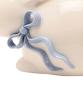 Widdop white stoneware bunny ornament with blue bow - British product