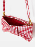 Oliver Bonas red gingham bow clutch bag with gold zip, UK version