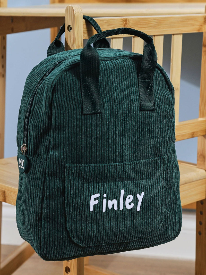 My 1st Years mini forest green cord backpack, imported from the UK
