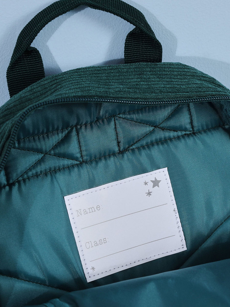 My 1st Years mini forest green cord backpack, imported from the UK