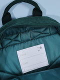 My 1st Years mini forest green cord backpack, imported from the UK