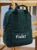 My 1st Years mini forest green cord backpack, imported from the UK
