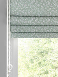 Sage green Shelby Roman blind with floral print, UK version