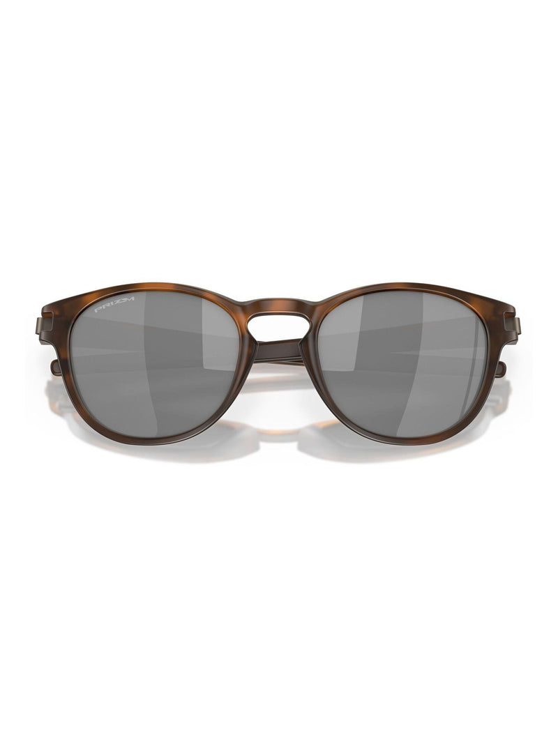 Oakley Latch Oval sunglasses brown tortoise Prizm Black, imported from the UK