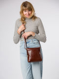 Conkca Cassia brown leather cross-body bag, imported from the UK