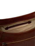 Conkca brown Vivienne leather grab bag with brass fittings, imported from the UK